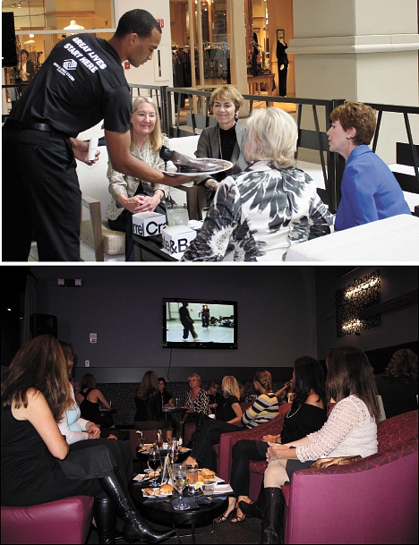 A 'waiter' (top) serves up a sample of footwear fashion at a preview event of Bellevue Fashion Week on Thursday