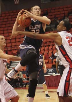 Keaton Hayenga drives to the basket during a game with Bellevue College.