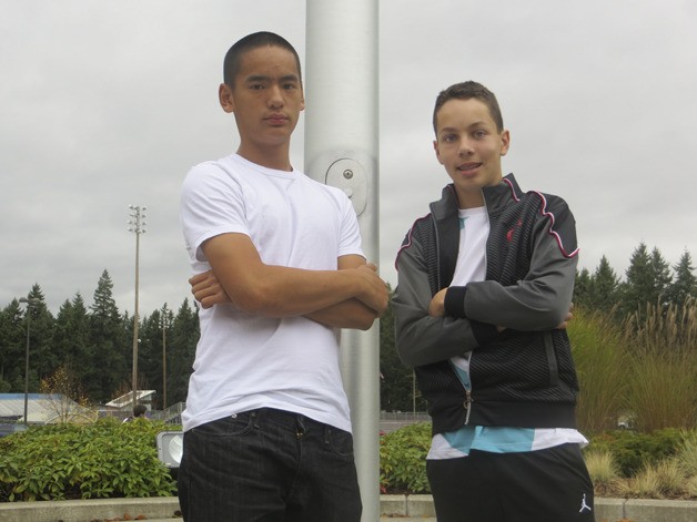 Luat Le (left) and Connor Garnett are back to lead the Saints on the tennis court after winning the last two 2A state singles titles.