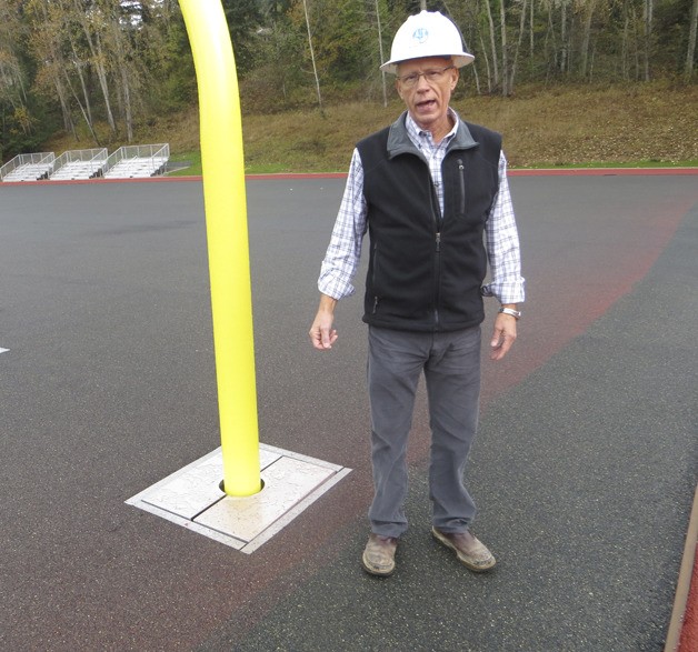 Jack McLeod at the nearly completed multipurpose field at International School