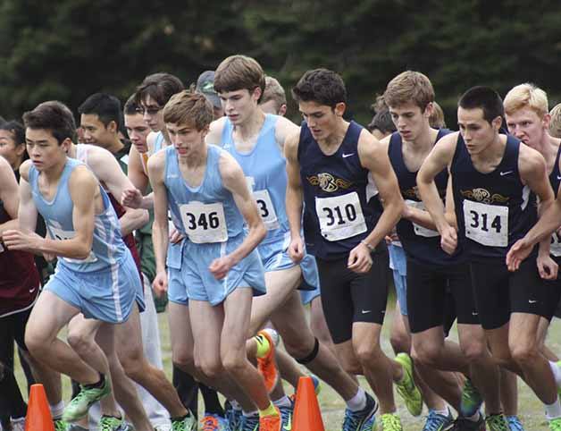 Interlake and Bellevue runners leave the starting line at the 3A Sea-King District Cross Country Meet