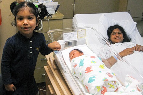 Mukunth Mageshbabu became the first baby of the year in the region when he was born at 12:01 a.m. Jan. 1 at Overlake Hospital. He was 7 pounds 12 ounces and 20 inches long. Mom