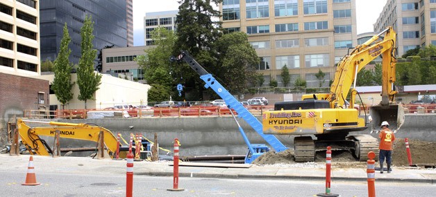 Construction crews have begun work near the corner of 106th Avenue Northeast and Northeast Second Street on the first of two high-rise developments that comprise Soma Towers