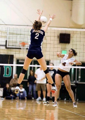 Kami Mcclain throws down a block for Eastside Catholic.