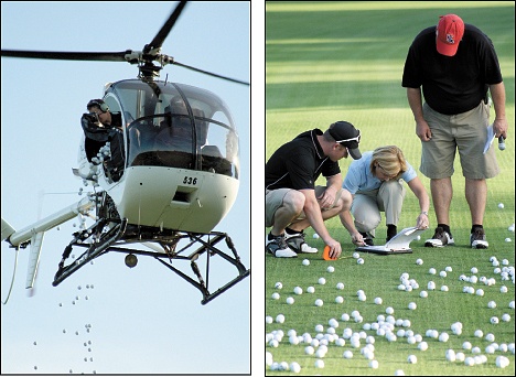 Golf balls are poured from a helicopter hovering over Overlake Golf and Country Club on Thursday