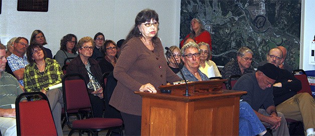 Trudie Glenn of Carnation speaks to the King County Public Hospital District 4’s board of commissioners about the importance of preserving funding for the Adult Day Health program for seniors and caregivers at Sno-Valley Senior Center. She was among a number of patrons