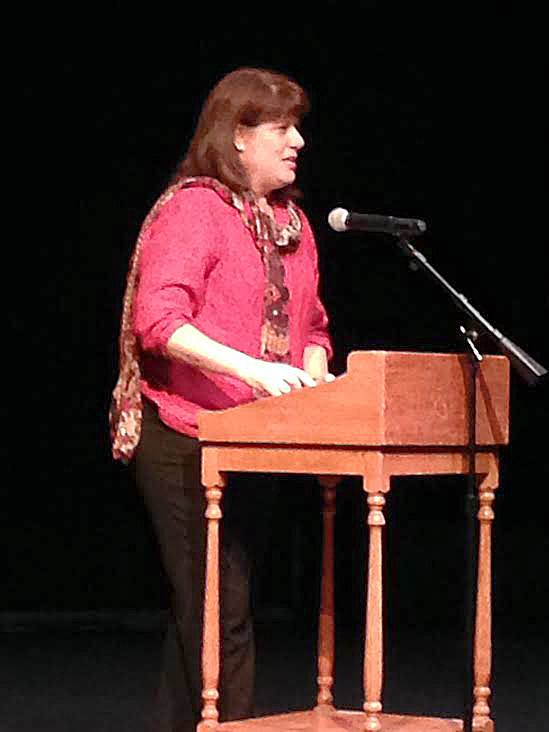 Newly-elected King County Commissioner Claudia Balducci addresses a gathered crowd at Bellevue Youth Theatre after being sworn into her new county position. Balducci recently left her position as Bellevue's mayor to take up the King County slot.