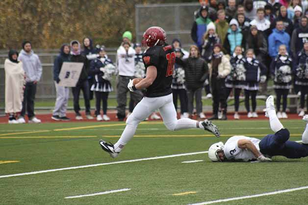 Newport senior Conner Baumann had three touchdowns against Bellarmine Prep.