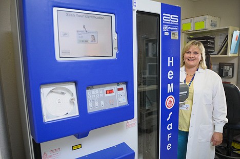 Puget Sound Blood Center blood bank coordinator Andrea Nordmark shows the new HemoSafe