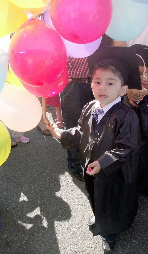 Joel Dauila Catillo enjoys the graduation at Kindering.