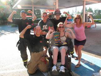 Bellevue Fire Department 'Make A Muscle' during the fundraiser for the Muscular Dystrophy Association (MDA). Top row