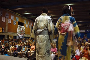 Two models in the yukata fashion show look over the crowd at Aki Matsuri Sept. 11. The matsuri is a Japanese arts and culture festival held each Septemver at Bellevue College over two days.