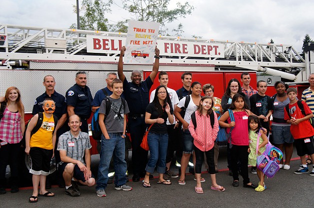 A back-to-school event at Bellevue Fire Station 3 provided backpacks and school supplies to members of the YES Success Mentoring program.