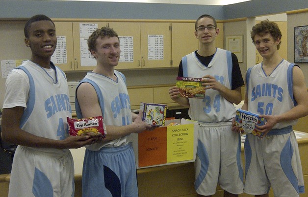 (Left to right) Interlake basketball players Austin Clark