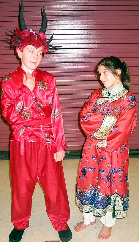 Tyee Middle School students Chip Conyard as Mushu and Shereen Khatibloo as Mulan rehearse their roles in the upcoming production of Disney’s Mulan.