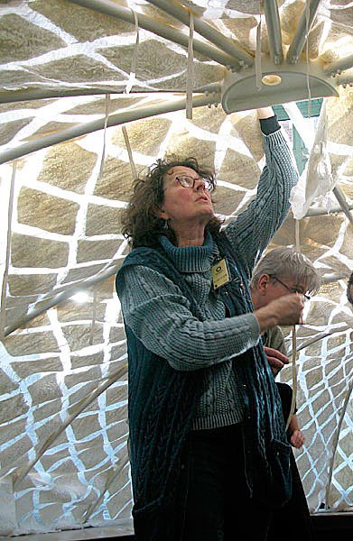 Felt artist Janice Arnold works on one of her projects.