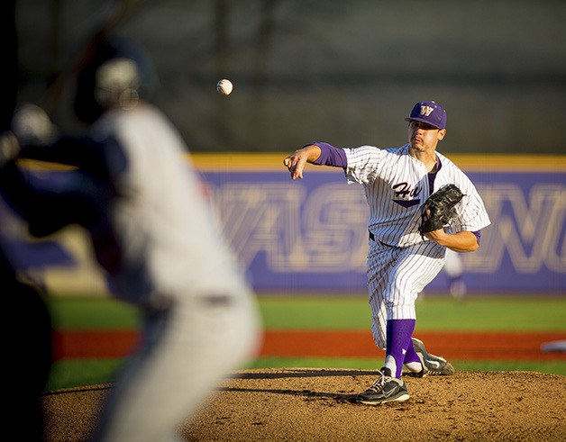 Jared Fisher throws a pitch during a game this season at the renovated Husky Ballpark.