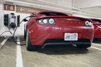 A number of electric cars including the sporty Tesla Roadster were shown off at an opening ceremony for electric vehicle charging stations at Bellevue Square Tuesday