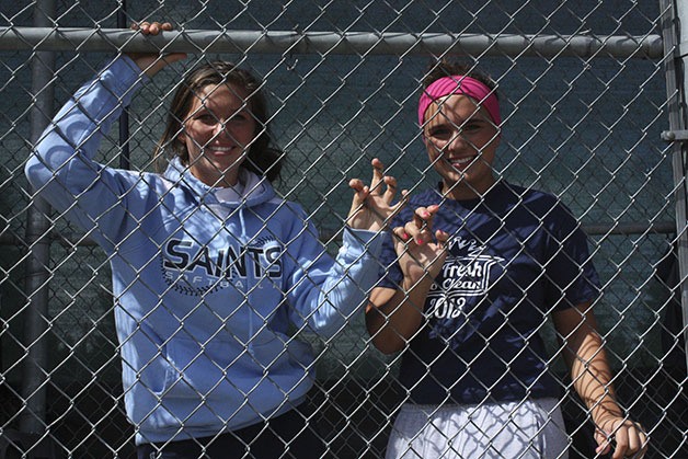 Ashley Scott (left) and sister Erin have Interlake in the 3A state tournament.