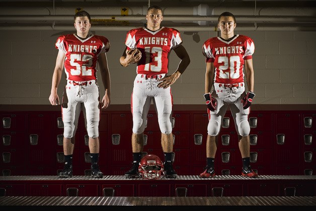 Spencer Bursek (left) will pave the way for quarterback Isaac Dotson (center) and running back Neil Hones (right).