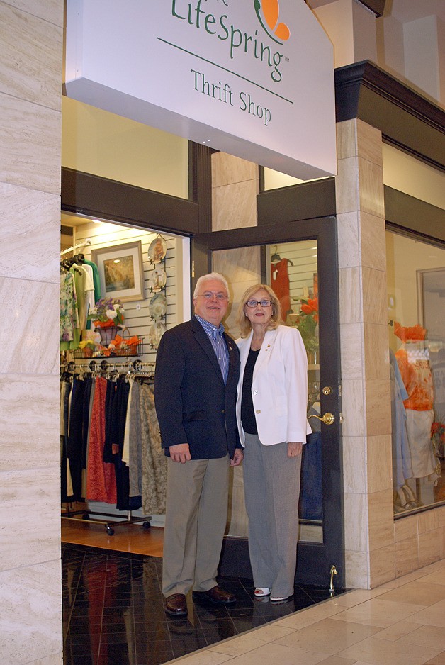 Steve McGraw and Trish Carpenter stand at the entrance to LifeSpring’s Thrift Store at Bellevue Square. Kemper Freeman