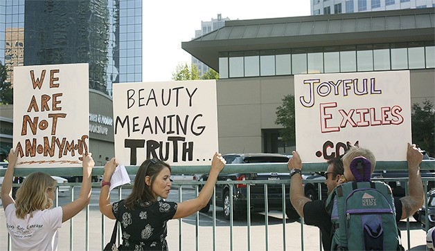 More than 40 protesters gathered outside the Mars Hill Church Bellevue on Sunday to call for the ouster of its pastor