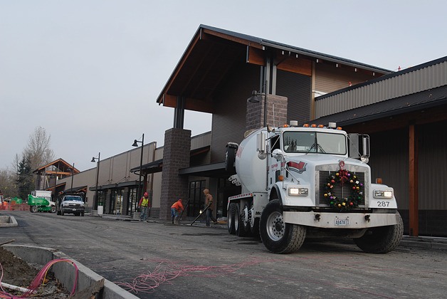 The old Kmart building is getting a makeover from crews and will anchor the new Kelsey Creek Center.