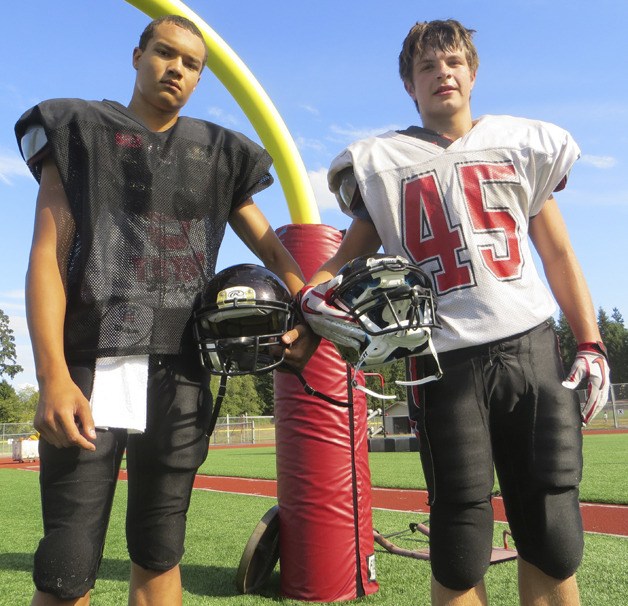 Junior quarterback Terrence Allen (left) and linebacker William Beck are just two of a host of underclassmen that will lead the Totems in 2012.