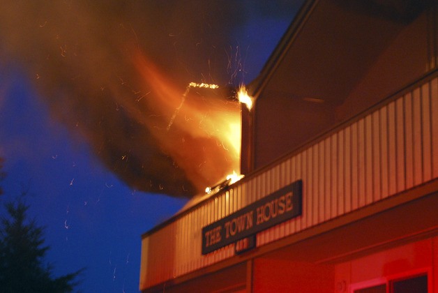 A fire burned this upstairs unit at the Town House Apartments in Bellevue Sunday night.