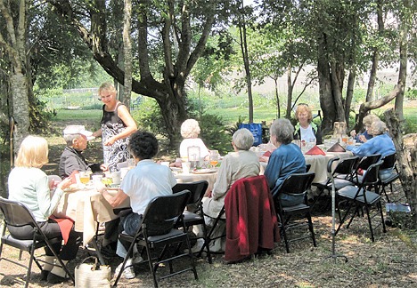 Residents at Aegis of Bellevue enjoy a strawberry banquet at 21 Acres farms.