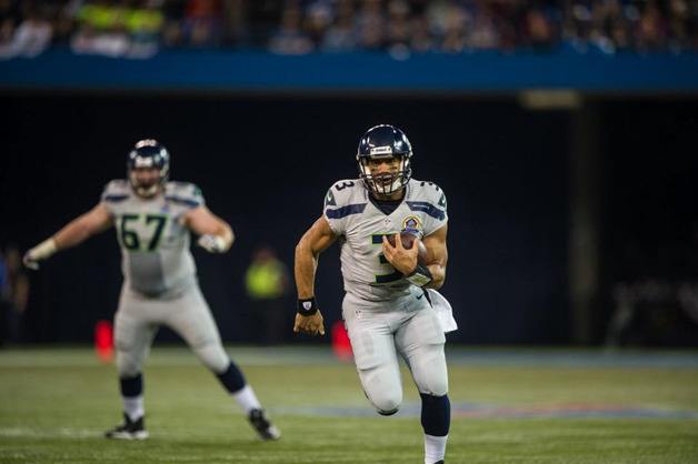 Russell Wilson ran for three scores in the win over Buffalo.