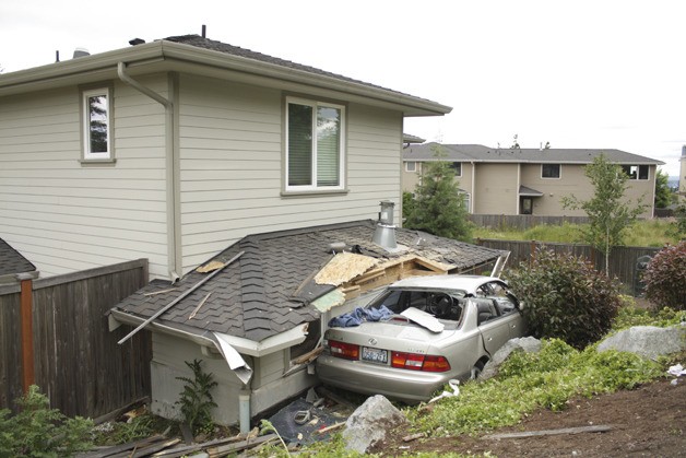 The driver was traveling uphill on 117th Pl. S.E. in Bellevue when she attempted a left turn and accelerated