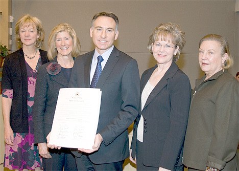 The four women serving on the Metropolitan King County Council flank County Executive Dow Constantine (l-r) Councilmember Julia Patterson