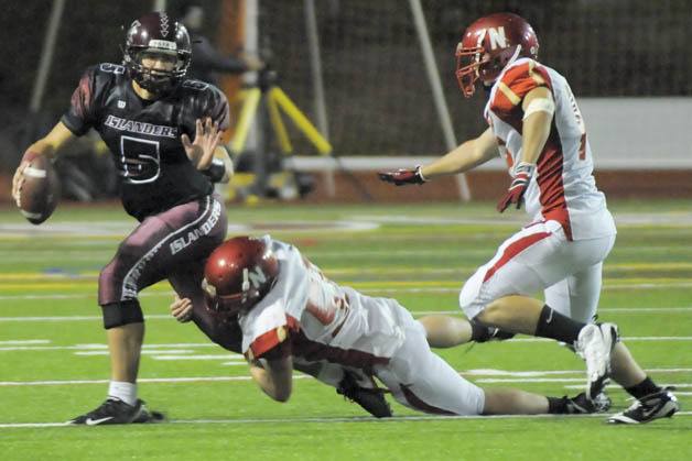 Mercer Island quarterback Jeff Lindquist (above in a 2010 game against Newport) has the attention of the Bellevue defense heading into tonights showdown.