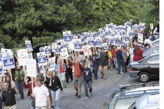 Hundreds of Bellevue school teachers and others picket at the Bellevue School Board meeting Wednesday as the teachers and district continue to seek agreement on a new contract.