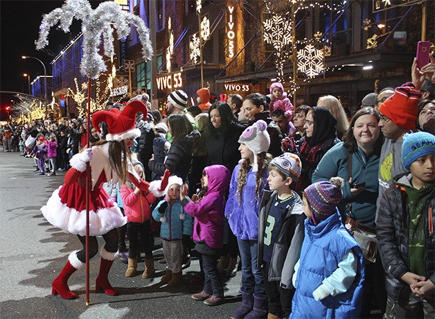 One of the multitudes of Snowflake Lane performers entertains children during a nightly performance. The young performers must have enthusiasm and big personalities to be selected for the show.