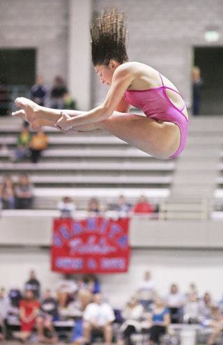 Diana Wilcox of Bellevue competes in Saturday’s Class 3A state swim and dive championships at the King County Aquatic Center in Federal Way. Wilcox won the dive title with a total of 418.95 points.