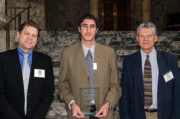 Deric Gruen (center) of Bellevue College receives his award from Keith Cotton (left) and Ted Horobiowski.