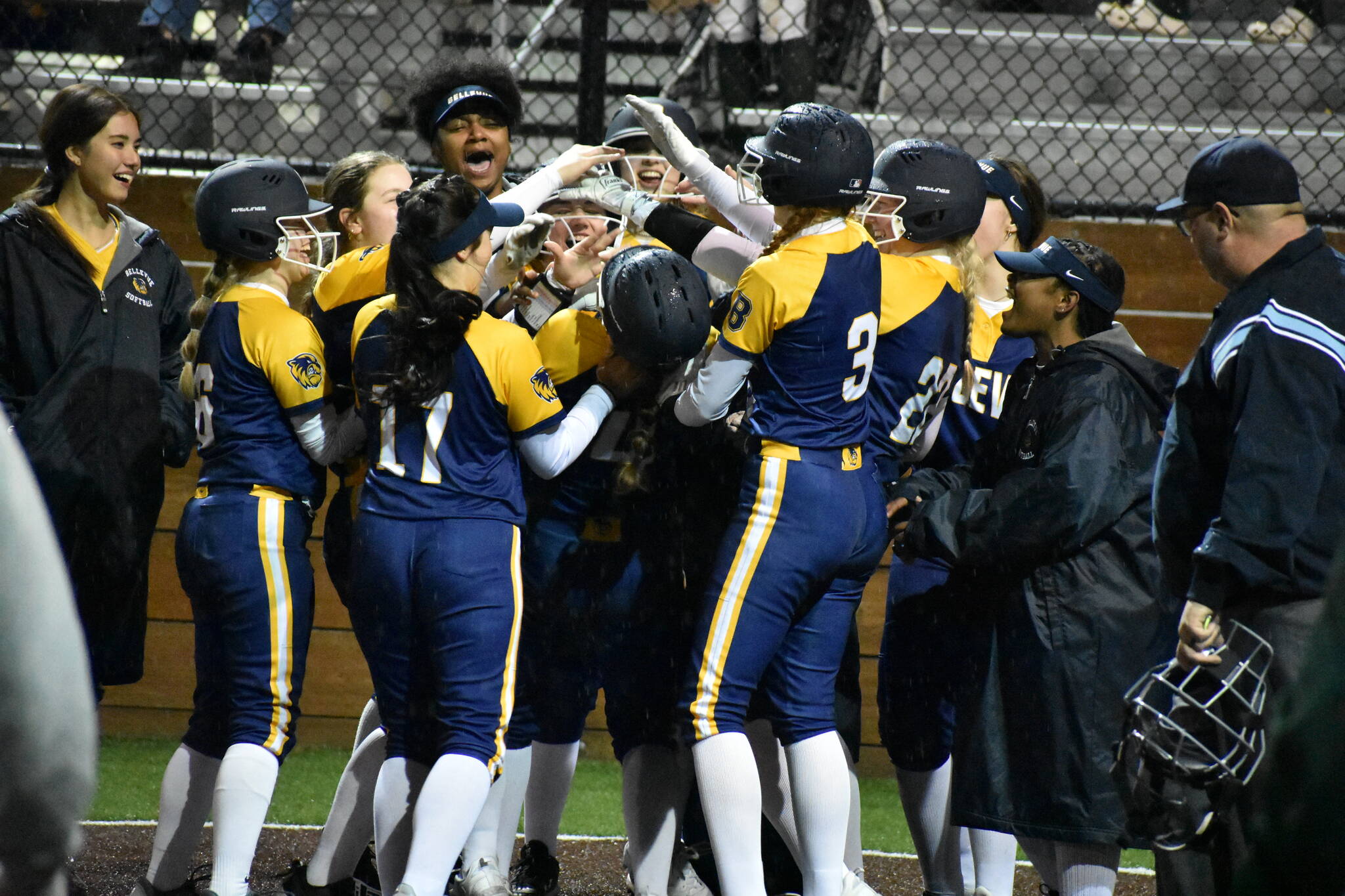 Bellevue celebrates a grand slam in the fifth inning. Ben Ray / The Reporter
