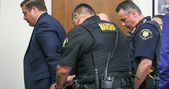 Auburn Police Officer Jeffrey Nelson is escorted out of the courtroom following the guilty verdict at his murder trial June 27, 2024. (Ken Lambert / The Seattle Times / Pool)